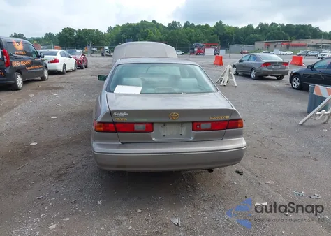 1999 Toyota Camry Le from USA, damaged, VIN 4T1BG22K3XU871911